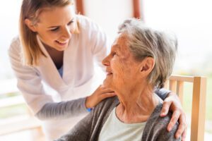 A caregiver helping a senior