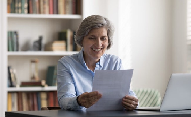Woman Studying Her Long-Term Care Policy